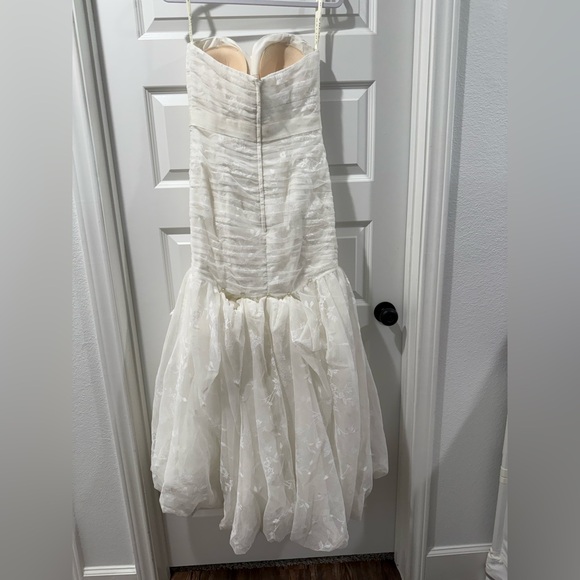 Elegant Strapless Ivory Wedding Dress - Picture 3 of 15